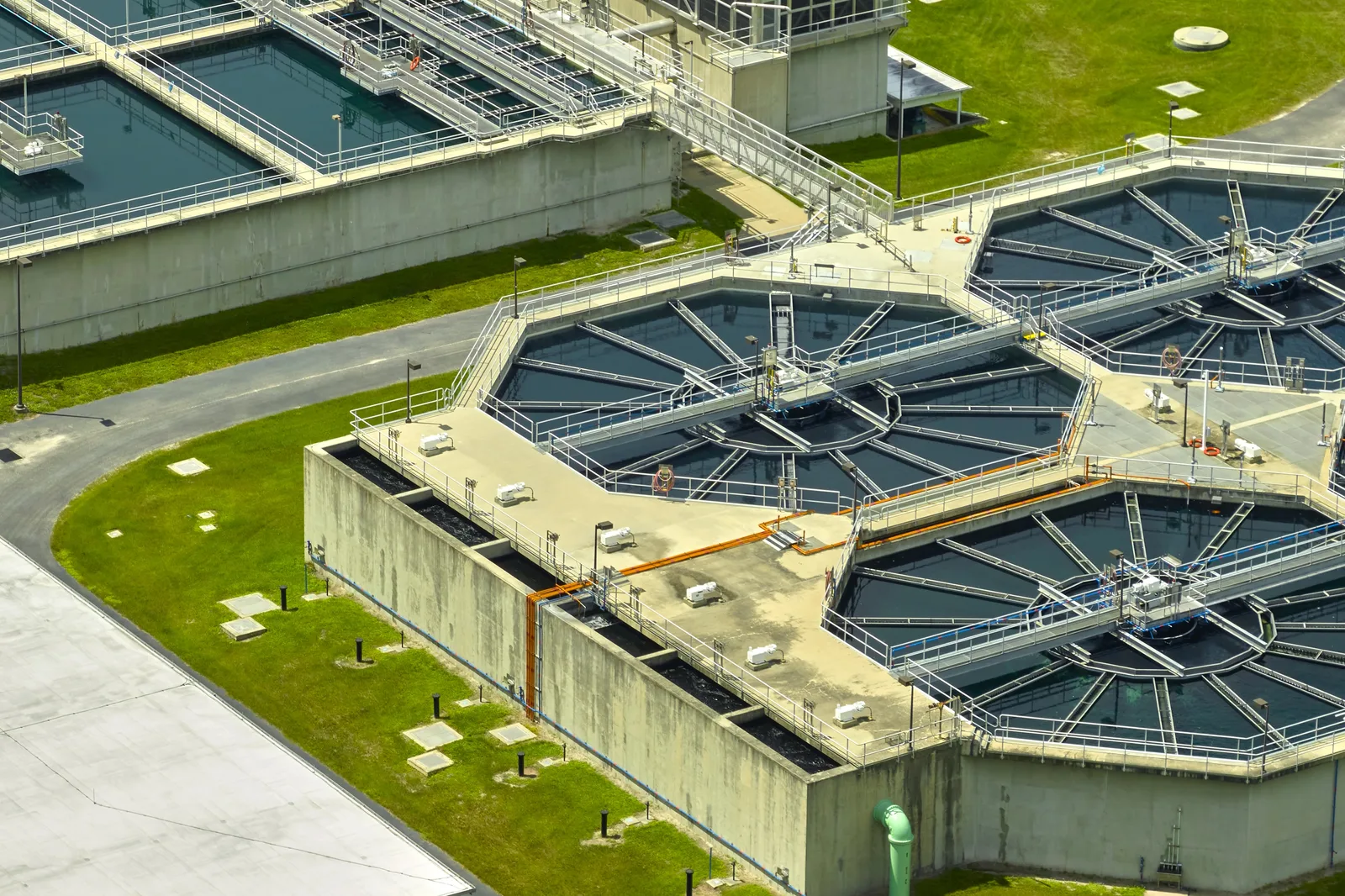 Aerial view of octagonal clarifier basins at a municipal water treatment plant.